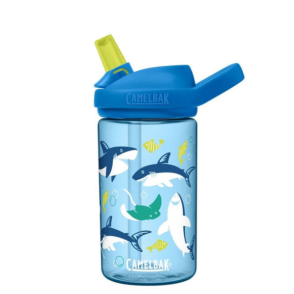 Studio shot on a white background of the left hand side of the Camelbak childrens Eddy plastic water bottle in 410ml showing the shark graphics and pop top drinking spout