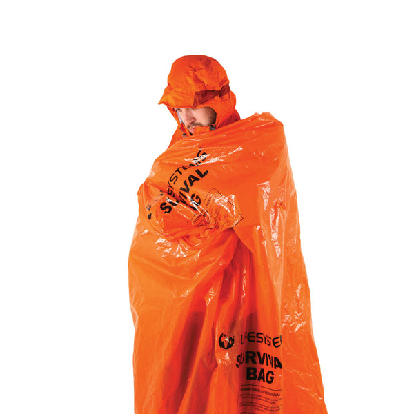 Lifesystems plastic survival bivi bag with a person inside it .