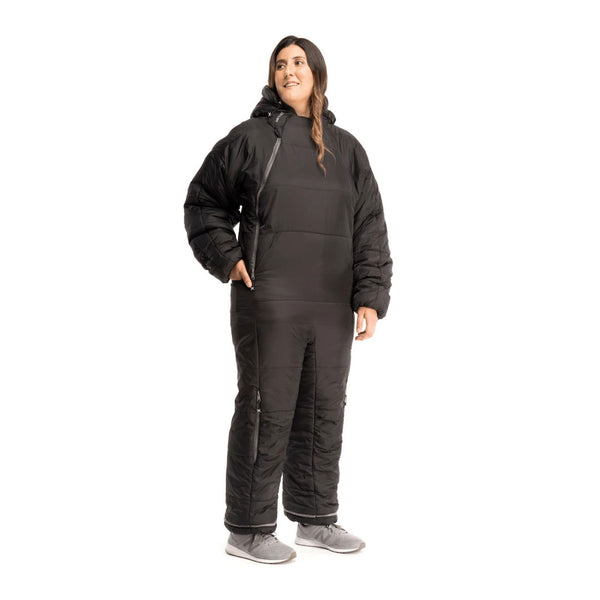 Studio shot on a white background of a Selk'Bag Original 6G sleeping bag suit worn by a female showing the front detail